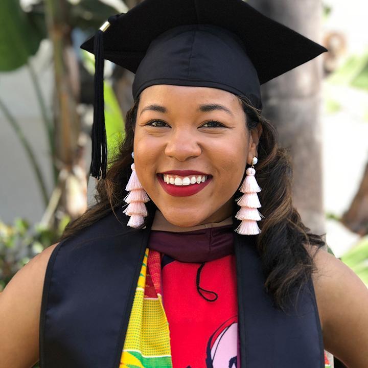 Lena Jennings wearing graduation cap and gown